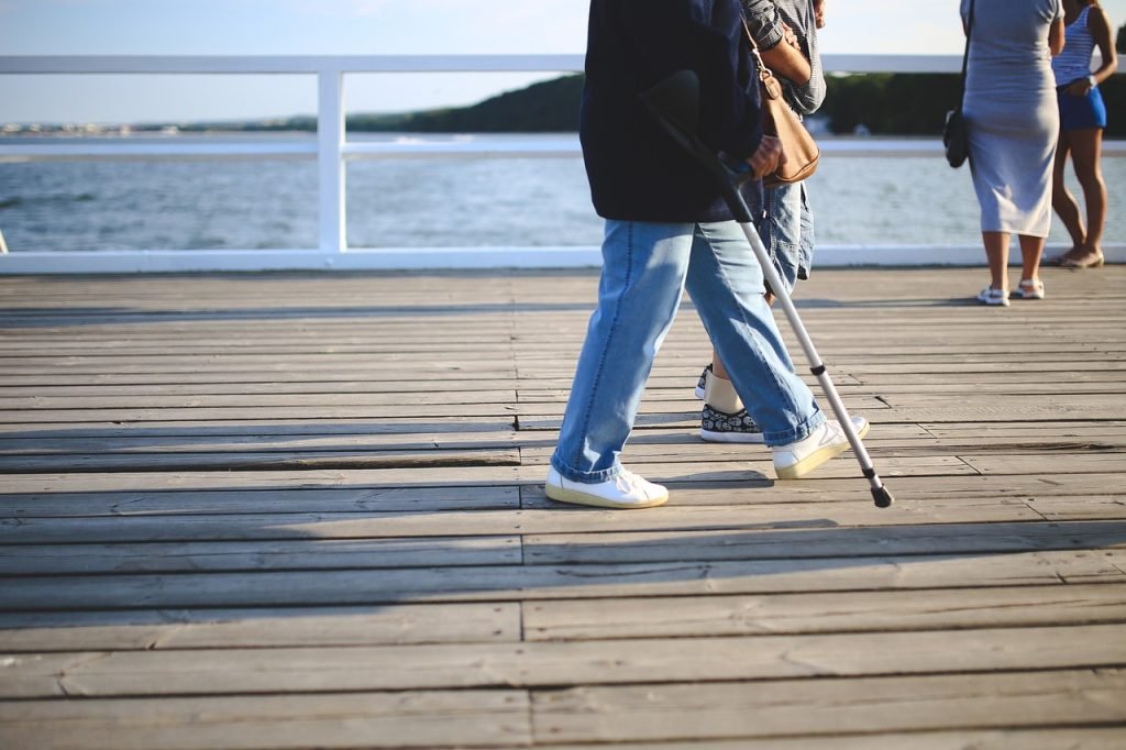 Work Injuries: Proven Ways To Legally Protect Your Rights 2 Woman, Crutch, Old image