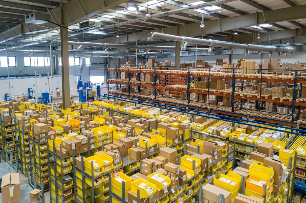 Efficient Warehouse Space Management: Tips And Tricks 1 yellow and white plastic box lot